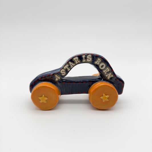(no) Toy Car – Blue stars